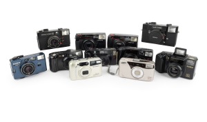 PLASTIC POINT-AND-SHOOT CAMERAS: 1980s-90s group, the brands comprising Fujifilm (2), Konica (4), Minolta, Pentax (2), and Samsung (2). (11 items)