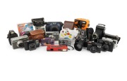 Collection remainder comprising a diverse accumulation of 21 different cameras; inspection will reward.