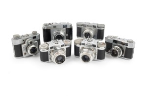RANGEFINDER CAMERAS: Circa 1950s group comprising Braun Paxette (2), Braun Super Paxette, Okaya Optic Lord IVA, Sanei Samoca-35, and Yamato Atlas 35 II. (6 items)