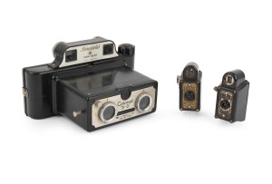 CORONET: Two "Midget" black-Bakelite miniature viewfinder cameras, c. 1935, together with a Coronet 3-D Binocular Viewfinder. (3 items)