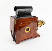Large c. 1890s mahogany and brass MAGIC LANTERN with rack-and-pinion lens, tin chimney element, side-opening door with red glass peephole, "W. Watson & Sons 251 Swanston St Melbourne" retailer's plate; later retrofitted for electricity, dimensions approx. - 2