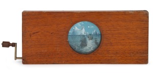 ARCTIC EXPLORATION: Mid-19th century "eccentric movement"-type wooden slide for magic lantern; foreground depicts rocking sailship with British Red Ensign and narwhal, mid-field depicting another ship sailing left to right, background depicting static arc
