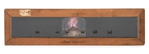 ERUPTION OF MOUNT VESUVIUS: Panoramic slipping slide for magic lantern, likely depicting one of the many eruptions that took place in the 19th century; 8 x 30.5cm overall.