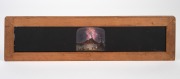 ERUPTION OF MOUNT VESUVIUS: Panoramic slipping slide for magic lantern, likely depicting one of the many eruptions that took place in the 19th century; 8 x 30.5cm overall. - 2