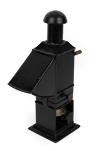 19th-century lecturer's lantern projector, lacquered tin, integrated bell and red-glass peephole; height 28cm.