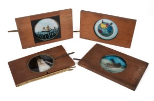 Four single lever-type wooden slides for magic lantern; subjects include a rocking lifeboat, a ship and globe, and an early steamship; generally 10 x 17.5cm overall.
