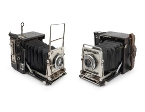 GRAFLEX: Two different c. 1930s side-handle type Speed Graphic press cameras; back elements absent.