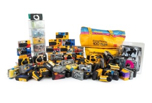 DISPOSABLE CAMERAS: A 1990s accumulation (mostly shells, the majority Kodak; nevertheless a good quantity unused in retail packaging), together with two Kodak insulated film bags. (70+ items)