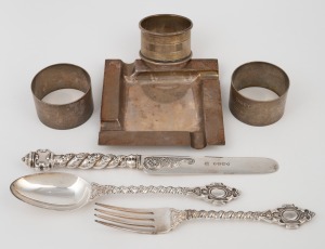 Sterling silver napkin rings, cutlery and ashtray, 20th century, (7 items), 298 grams total.
