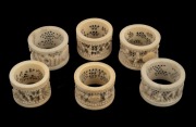 Six assorted Chinese carved ivory napkin rings, 19th/20th century, ​​​​​​​the largest 4cm diameter.
