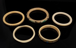 Five assorted vintage bangles including ivory, bone and plastic, 20th century.