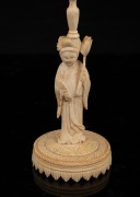 A Chinese carved ivory puzzle ball on figural stand, early to mid 20th century, 22cm high overall. - 3