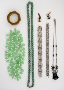 Vintage glass bead necklace, jade bead necklace, bakelite napkin ring, vintage cufflinks, a 935 silver and paste Art Deco bracelet, a costume Art Deco bracelet, and a glass bead necklace, 20th century, (7 items), the green glass bead necklace 77cm long.