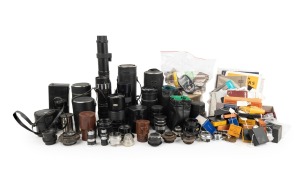 Collection remainder comprising a diverse accumulation of lenses, lens filters, light meters, ephemera, and other accessories (100s); inspection will reward. (qty.)