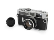 CANON: Canon Model 7 rangefinder camera [#867571], c. 1961, Canon 50mm f1.8 lens [#310296] with cap.