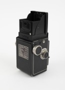 ROLLEI: Rolleicord IV TLR [#1390068], c. 1953, Schneider-Kreuznach Xenar 75mm f3.5 lens [#3875154], Synchro-Compur shutter, Rollei double lens cap, Rollei leather case. - 3