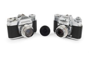 VOIGTL&Auml;NDER: Pair of SLR cameras, comprising c. 1964 Bessamatic M (Color-Lanthar 50mm f2.8/Synchro-Compur-X; with Accura lens filter and Voigtl&auml;nder lens cap) and c. 1967 Bessamatic CS (Color-Skopar X 50mm f2.8/Synchro-Compur-X). (2 items)