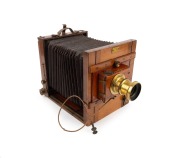 H&Uuml;TTIG & SOHN DRESDEN: Late-19th century tailboard camera [#42499], plate dimensions 16 x 12cm, Rapid Rectilinear 6&frac12; x 4&frac34; brass lens [#980] inscribed "Made in France for Baker & Rouse - Melbourne Sydney Adelaide Brisbane", roller-blind shutter, "Antinuous