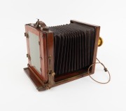 H&Uuml;TTIG & SOHN DRESDEN: Late-19th century tailboard camera [#42499], plate dimensions 16 x 12cm, Rapid Rectilinear 6&frac12; x 4&frac34; brass lens [#980] inscribed "Made in France for Baker & Rouse - Melbourne Sydney Adelaide Brisbane", roller-blind shutter, "Antinuous - 2