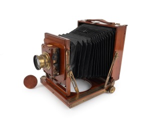 THORNTON-PICKARD: "Imperial" triple-extension view camera, plate dimensions 12 x 16.5cm, Thornton-Pickard Beck Symmetrical brass lens with leather cap, Thornton-Pickard roller-blind shutter.