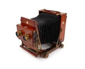 THORNTON-PICKARD: "Special Ruby" view camera [#530047], late-19th century, plate dimensions 12 x 16.5cm, twin Thornton-Pickard Beck Symmetrical lenses, Thornton-Pickard stereo roller-blind shutter, "Baker & Rouse" retailer's inlay.