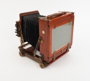 THORNTON-PICKARD: "Special Ruby" view camera [#530047], late-19th century, plate dimensions 12 x 16.5cm, twin Thornton-Pickard Beck Symmetrical lenses, Thornton-Pickard stereo roller-blind shutter, "Baker & Rouse" retailer's inlay. - 2