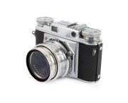VOIGTL&Auml;NDER: Prominent rangefinder camera [#B 61335], c. 1953, with Skoparon 35mm f3.5 lens, Synchro-Compur shutter, and Voigtlander UV 49s AR 317/49 lens filter.