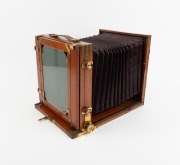 Late-19th century tailboard camera, plate dimensions 21.5 x 18cm, J.H. Dallmeyer 8&frac12; x 6&frac12; Rapid Rectilinear brass lens [#42288] with Waterhouse stop, "Baker & Rouse - Melbourne, Sydney, Adelaide, Brisbane" retailer's inlay. - 2