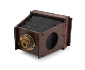 SHEW & CO.: Unusual "Guinea Xit" gate-struts camera, c. 1906, plate dimensions 7.5 x 10cm, uninscribed brass lens.