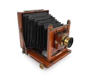 R.H. McBEAN EDINBURGH: Late-19th century view camera, plate dimensions 12 x 16.5cm, "Busch's Rapid Rectilinear F8" brass lens with iris diaphragm, Thornton-Pickard roller-blind shutter.