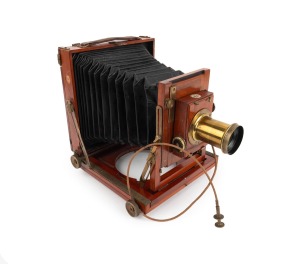 Triple-extension view camera, late-19th century, plate dimensions 12 x 16cm, "The Albion Albumenizino Co. Glasgow" brass lens with slot for Waterhouse stop, Thornton-Pickard roller-blind shutter, "Antinuous" shutter release.