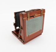 Triple-extension view camera, late-19th century, plate dimensions 12 x 16cm, "The Albion Albumenizino Co. Glasgow" brass lens with slot for Waterhouse stop, Thornton-Pickard roller-blind shutter, "Antinuous" shutter release. - 2