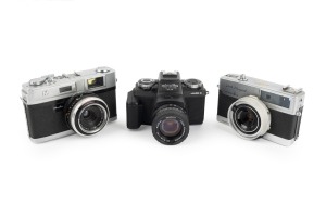 MINOLTA: Group comprising c. 1959 Minolta A3 M, c. 1964 Minolta 24 Rapid, and c. 1979 Minolta 110 Zoom SLR MKII. (3 items)