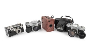Diverse group of cameras comprising c. 1939 Argus C3, c. 1965 Canon Pellix (in leather case), c. 1977 Kiev Arsenal Kiev 4M, and an early-Box Brownie type camera in red. (4 items)