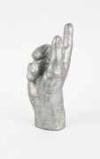 LEITZ: Rare hand statuette display stand for Leica CL camera, c. 1973, with "Leitz Wetzlar" in raised lettering on the wrist and "Eigentum der Ernst Leitz GMBH Wetzlar Made in W Germany" likewise on base. - 2