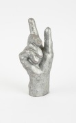 LEITZ: Rare hand statuette display stand for Leica CL camera, c. 1973, with "Leitz Wetzlar" in raised lettering on the wrist and "Eigentum der Ernst Leitz GMBH Wetzlar Made in W Germany" likewise on base. - 3