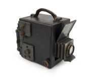 GRAFLEX: Revolving-Back Graflex Series B SLR camera, c. 1923, plate dimensions 8.5 x 10.5cm, Taylor-Hobson Cooke Kodak Anastigmat 6" f4.5 lens.