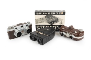 STEREO CAMERAS: Group comprising c. 1946 Haneel Tri-Vision in marbled brown, together with c. 1953 Revere Stereo 33, plus c. 1960s Brumberger Stereo Viewer in maker's box. (3 items)