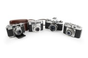 ZEISS IKON: Group comprising c. 1950 Contessa 533/24 (Tessar 45mm f2.8/Synchro Compur; with matching leather case), c. 1956 Contina 527/24 (Novicar-Anastigmat 45mm f2.8/Prontor-SVS), c. 1965 Contessa SLK (Tessar 50mm f2.8/Prontor SLK Spezial), and c. 1966