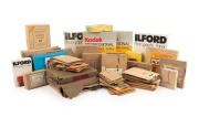 PHOTOGRAPHIC PAPER: A diverse accumulation of different brands, sizes, and eras, all in original packaging; brands include Kodak and Ilford. (60+ items)