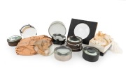 Group of magic lantern condenser lenses; multiple sizes present, the widest 18.5cm. (13 items)