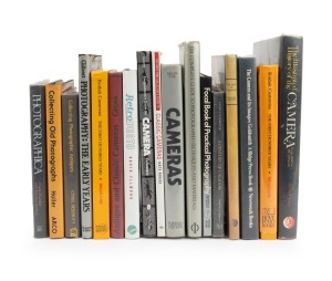 CAMERA BOOKS: A shelf of late-20th century hardcover books, focused on camera collecting and camera operation. (17 items)