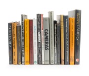 CAMERA BOOKS: A shelf of late-20th century hardcover books, focused on camera collecting and camera operation. (17 items)