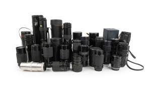LENSES: Diverse 1970s-90s group, mostly issued by minor Japanese manufacturers such Komura, Paragon, Sigma, Soligor, and Sun; most in cases. (19 items)