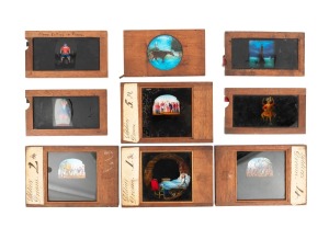 WOODEN SLIDES: Late-19th century group comprising one lever-type (horse drinking from river), four comedic slipping slides, and a "Soldier's Dream" part-set [4/5] of dissolving views for biunial by Newton & Sons; the largest 13.5 x 20.5cm. (9 items)