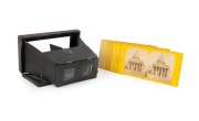 A late-19th century folding handheld stereoscope, together with ten different stereo views of Paris.