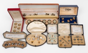 Antique and vintage buttons and studs, housed in nine plush fitted boxes, 19th and 20th century.