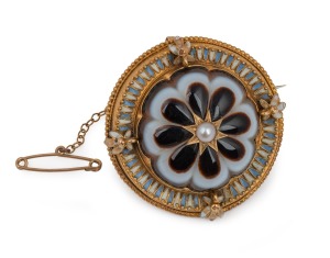 A fine quality antique 15ct yellow gold circular brooch adorned with an impressive carved banded agate, set with central pearl and finished in blue and white enamel around the border, mid 19th century, 5cm diameter, 15.9 grams total.