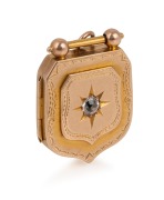 An antique 15ct yellow gold shield shaped locket, set with a rose cut stone, 19th century, 3.3cm high, 10.2 grams.