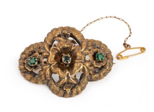 An antique 15ct gold and green stone brooch, 19th century, 4.5cm wide, 6.8 grams.